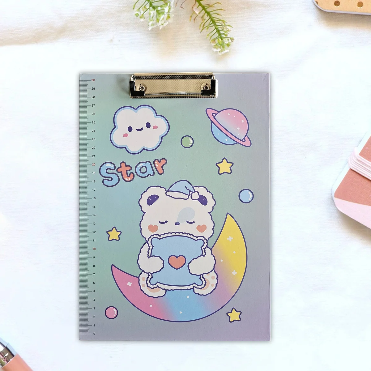 Set of four A4 cartoon clipboards with plastic material, low-profile clips, and ruler scale on the edge