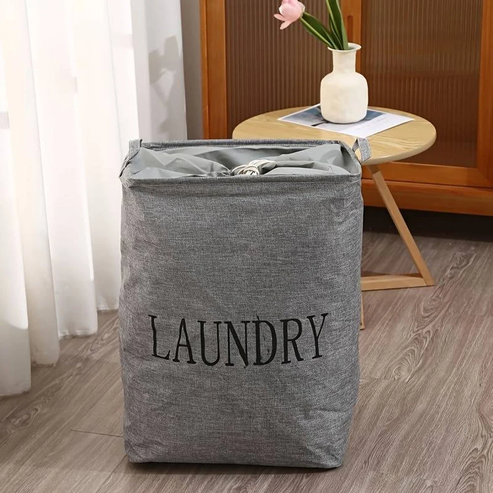 Foldable laundry bag standing upright with handles, made of linen and cotton, suitable for storing dirty clothes