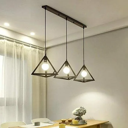 Modern pendant light with three matte black geometric triangle metal shades hanging from adjustable cables on a linear base