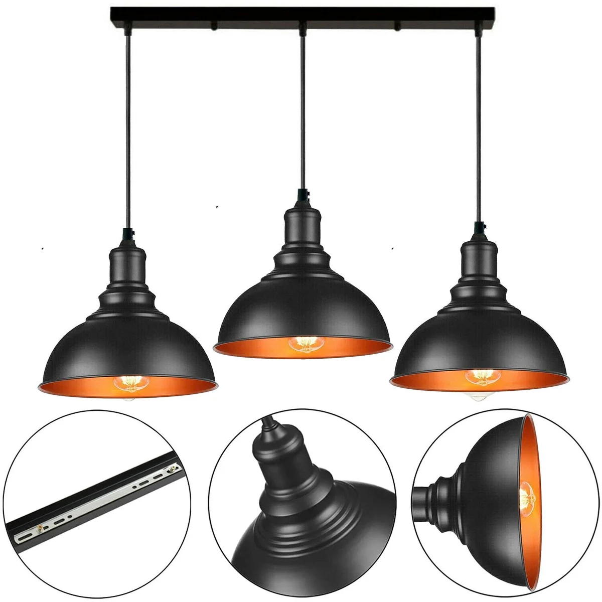 Three black metal dome lampshades hanging from adjustable cables in an industrial pendant ceiling light fixture design