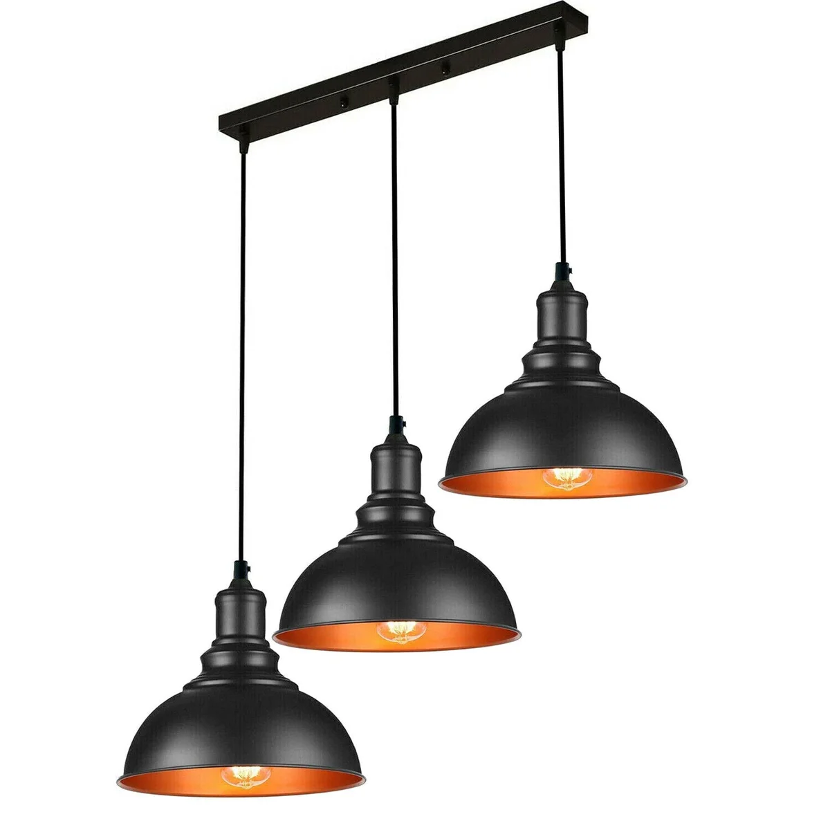 Three black metal dome shades hanging from adjustable cables in an industrial pendant ceiling light design