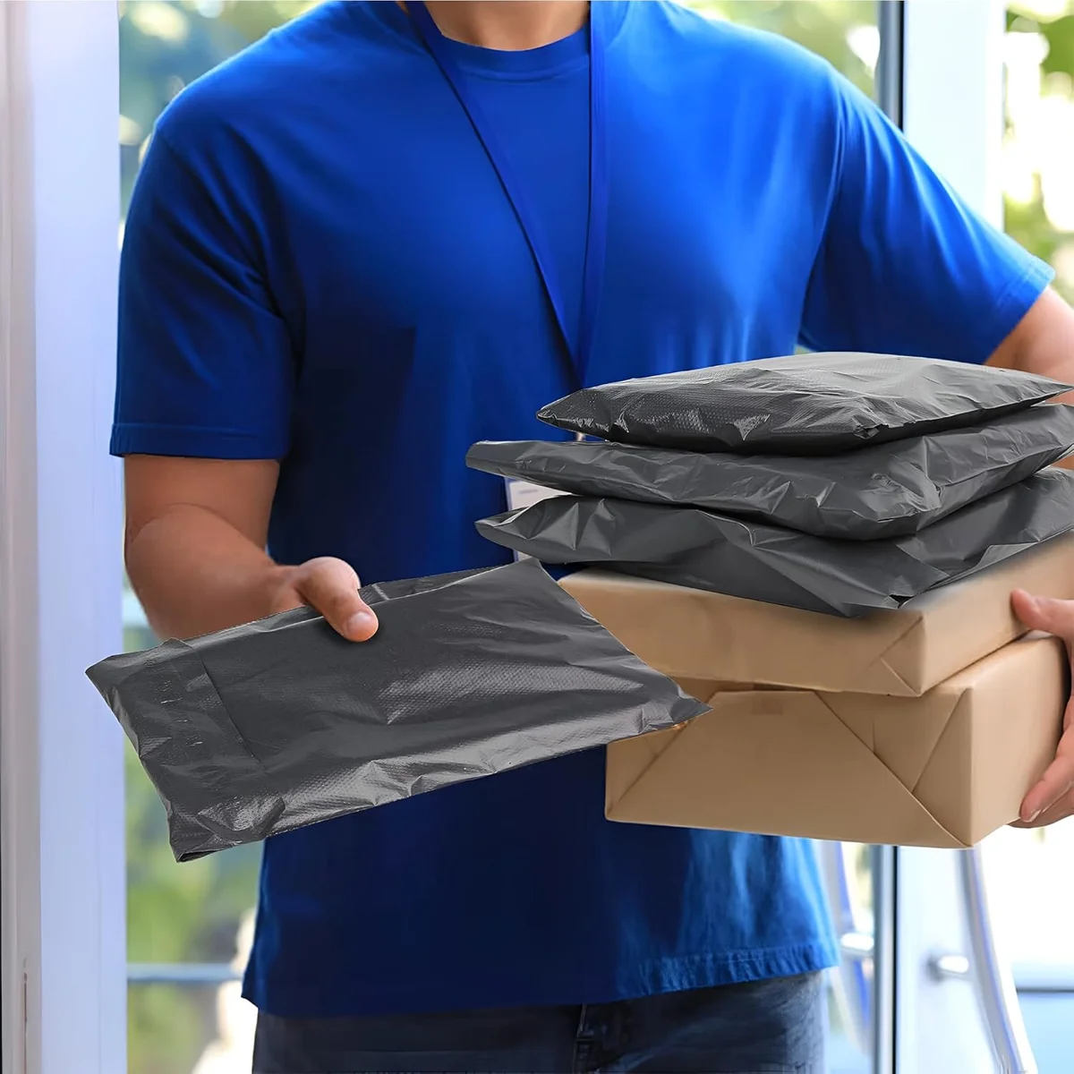 Stack of mixed size waterproof mailing envelopes with self-adhesive seals made from durable polyethylene material
