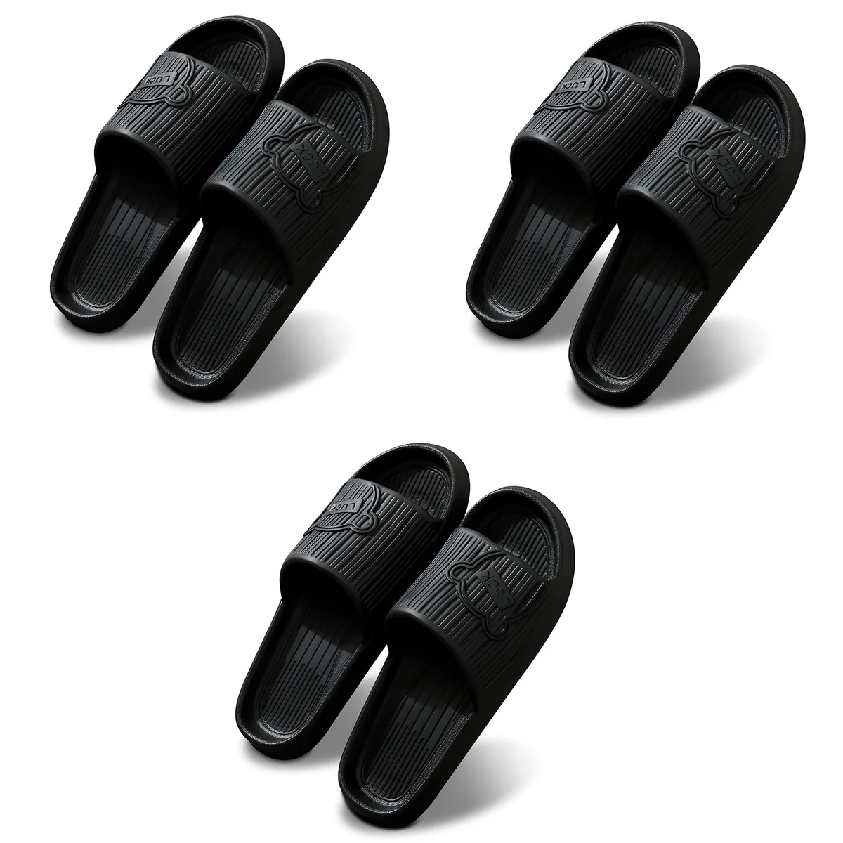 Pair of modern non slip home slippers in black EVA material with ergonomic design for men and women