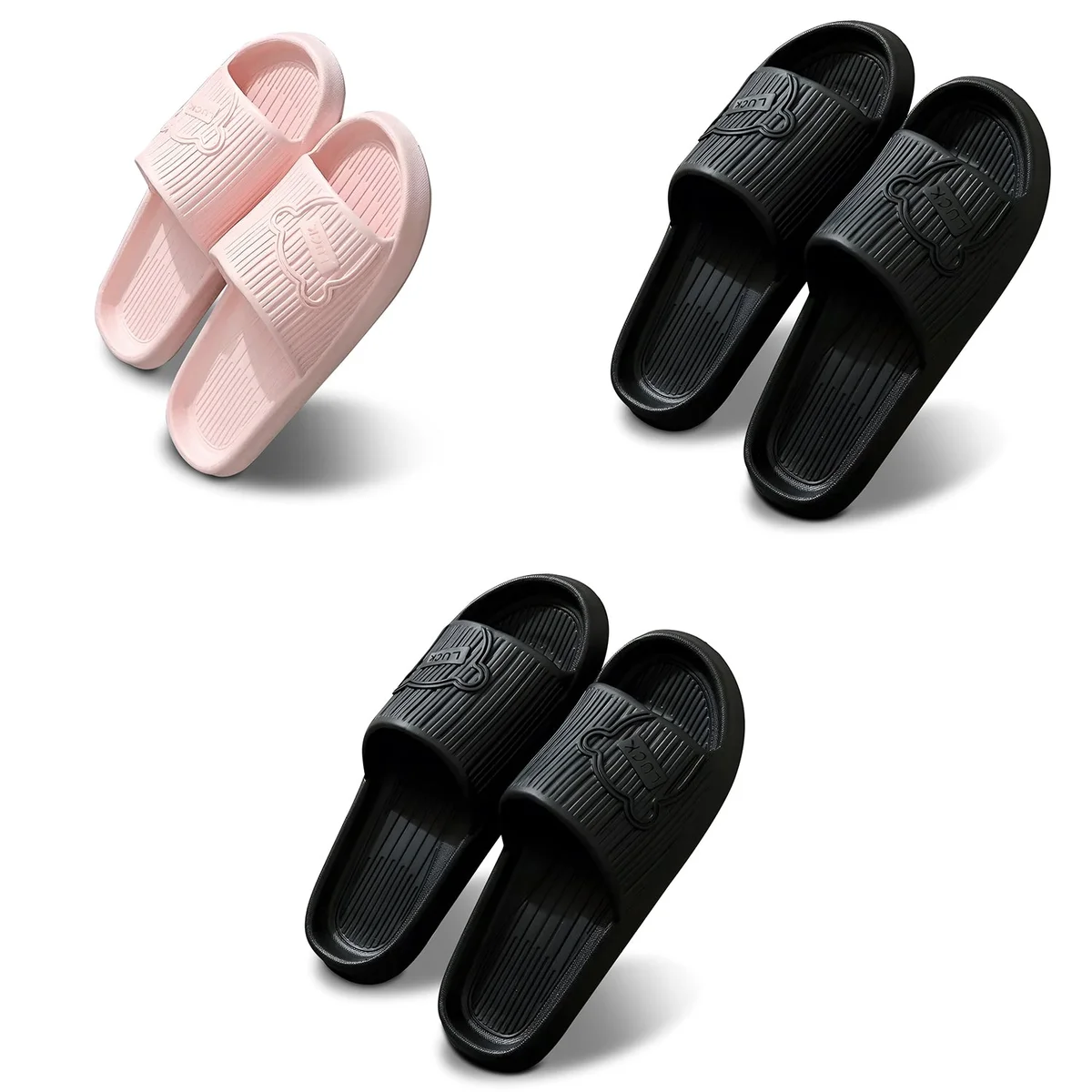 Pair of modern non slip home slippers in black EVA material with cushioned sole and ergonomic design displayed on white background
