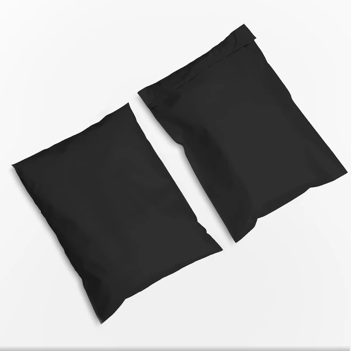 Stack of transparent waterproof mailing envelopes made from strong polyethylene with peel and seal closure on white background