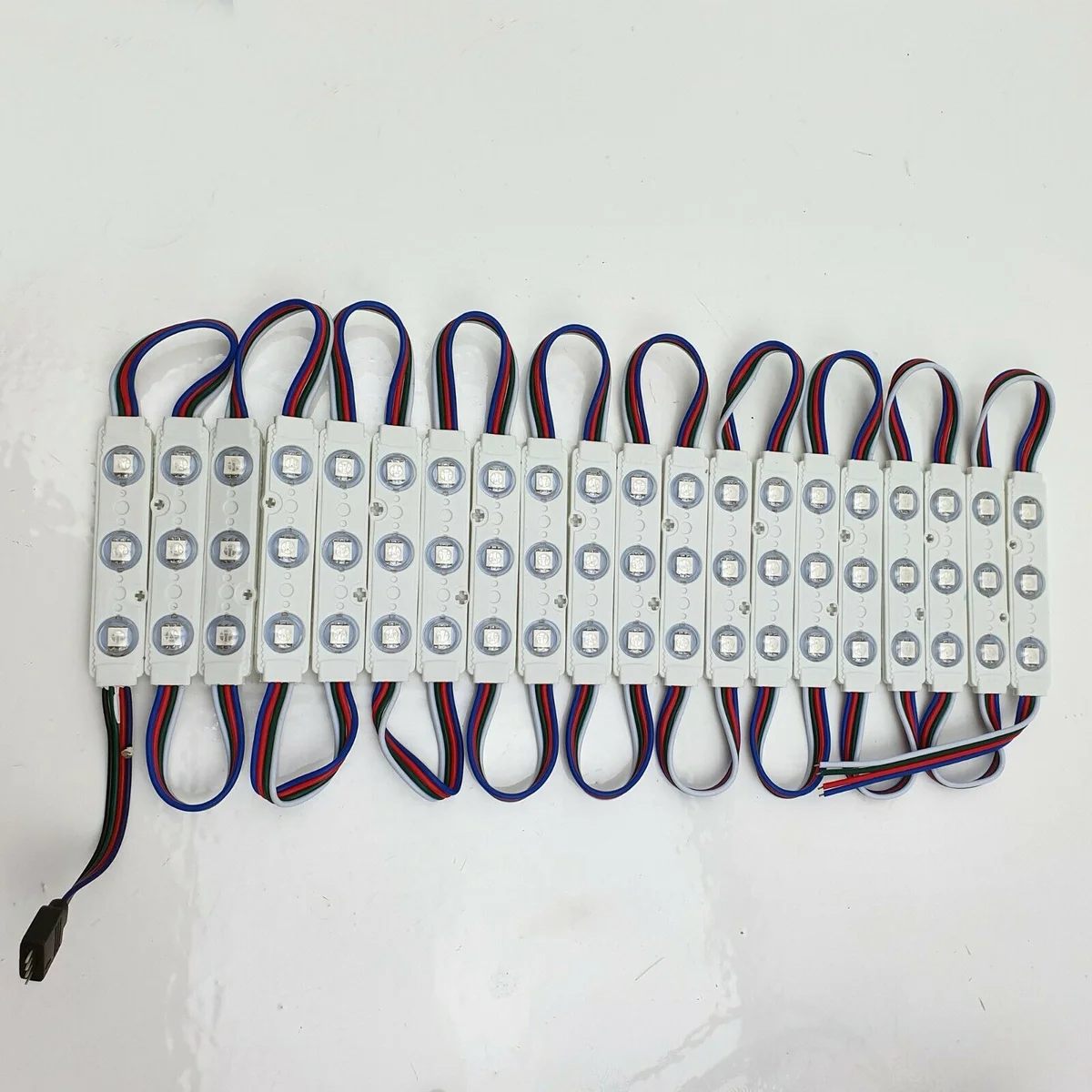 Close-up of IP67 LED strip module showing retro style SMD LEDs with adhesive backing for waterproof outdoor use