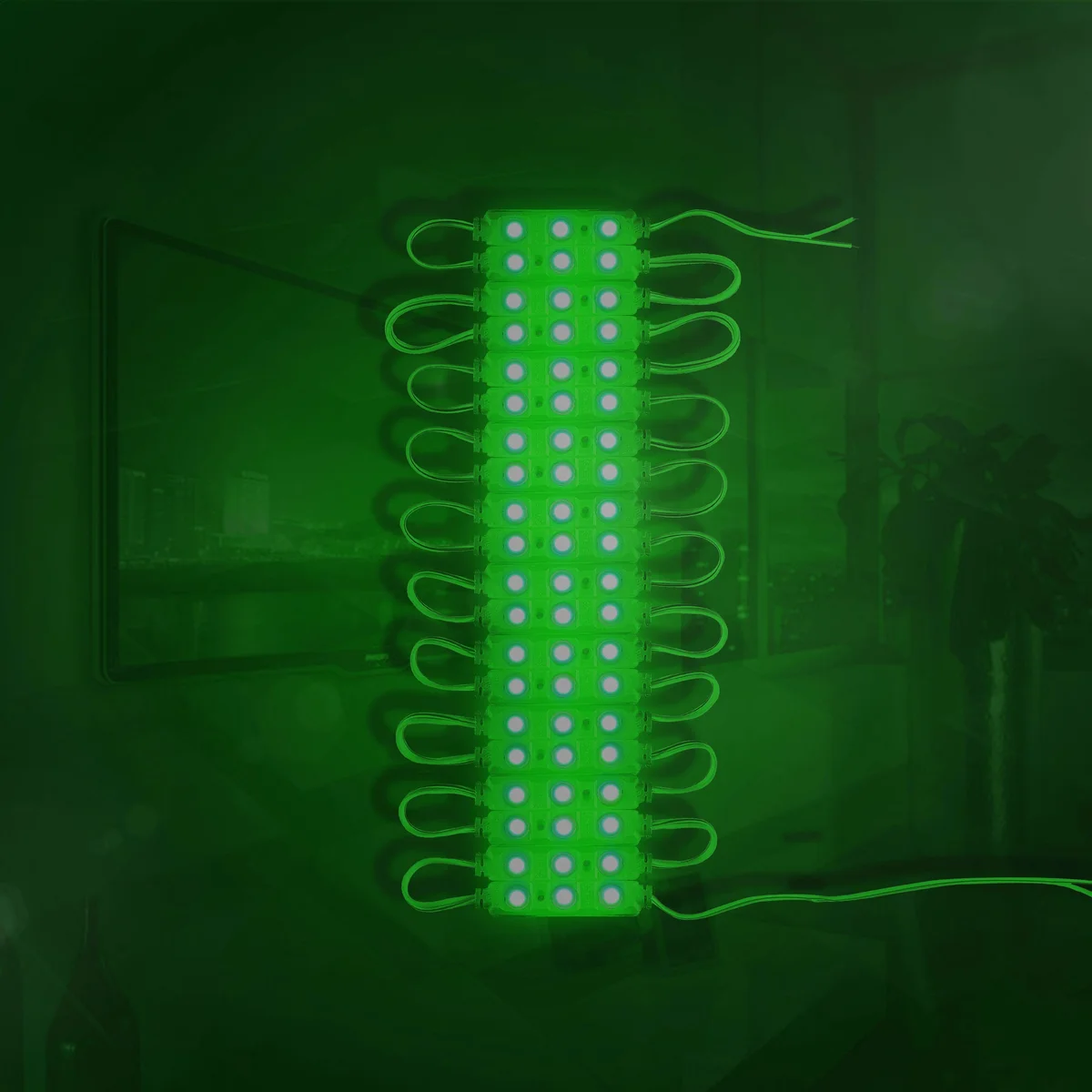 Compact green LED module with high-intensity 12V light, waterproof IP67 rated for indoor and outdoor use.