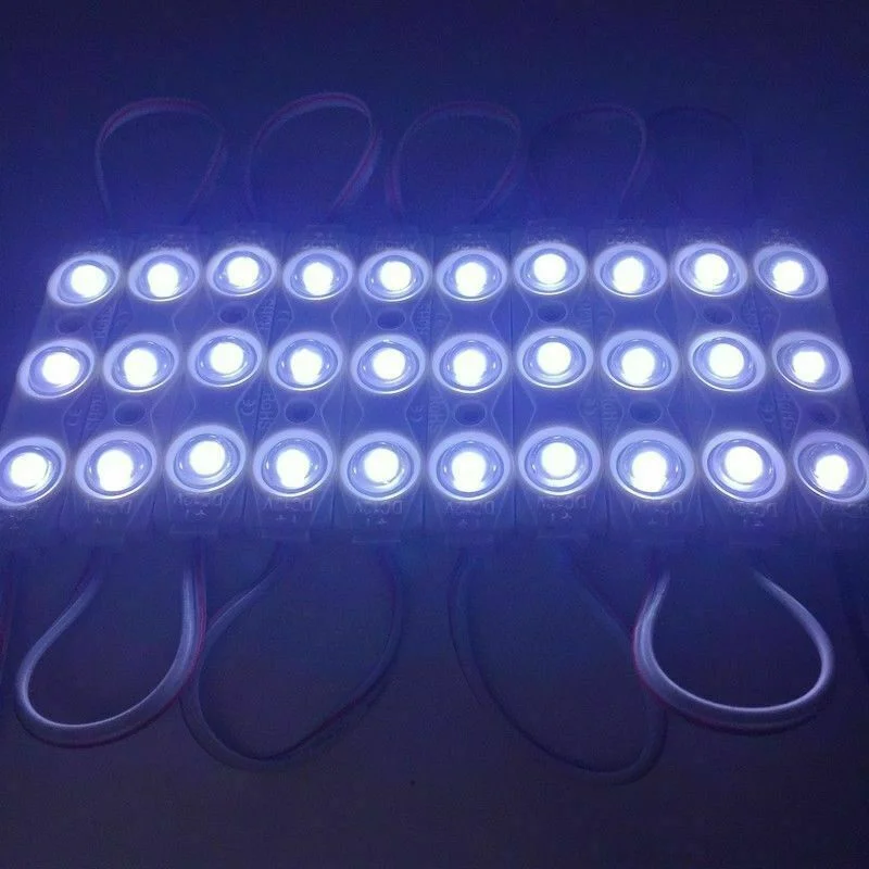 Cool white IP67 rated self-adhesive LED module strip with tape, showing multiple connected LED units on a flat surface