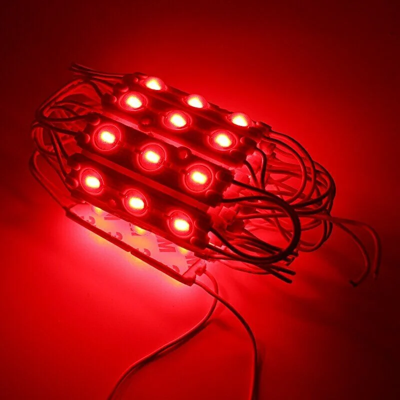 Red IP67 waterproof LED module strip light with SMD LEDs and double-sided adhesive backing on white background