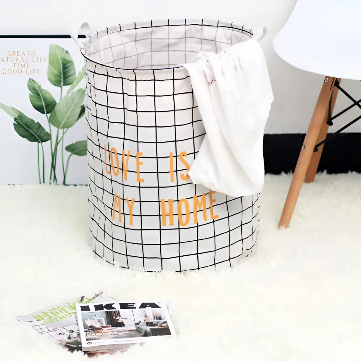 Two large black and white lightweight laundry bags with foldable cotton design and waterproof inner layer, side by side