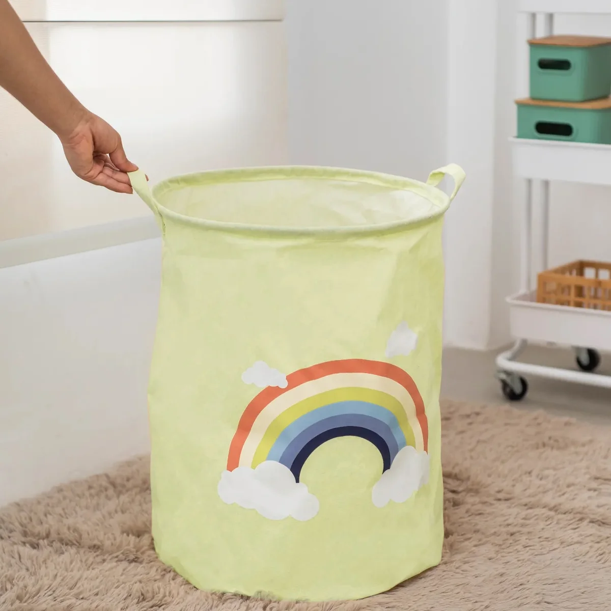 Two foldable kids laundry baskets with zebra face print in yellow, gray, and white, standing side by side