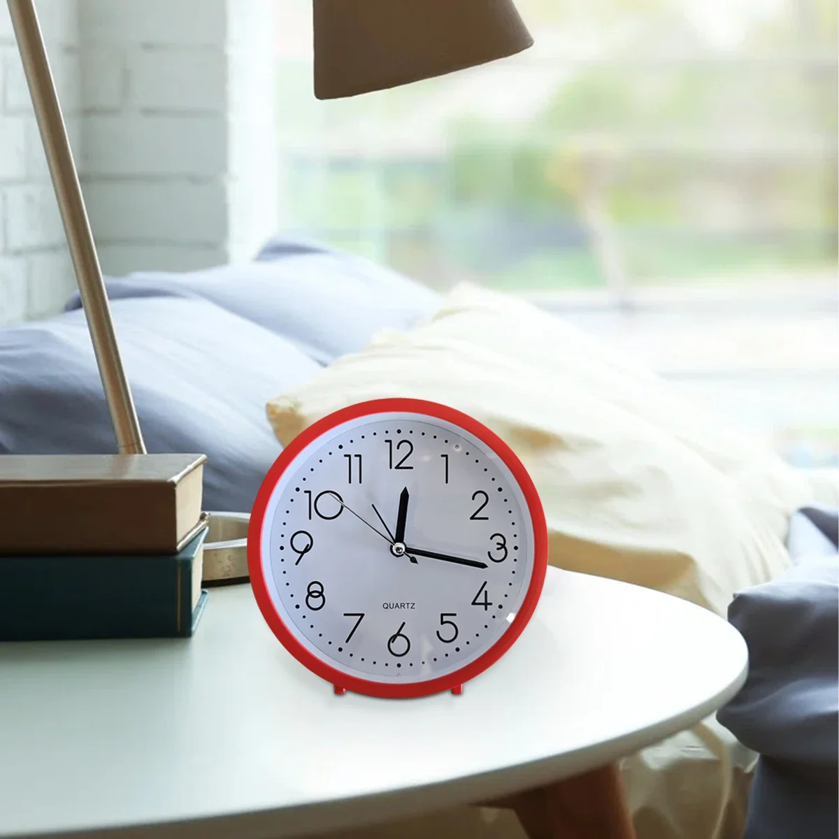 Retro alarm clock with white numerals, black frame, analog display, and soft night light, suitable for table or wall mount