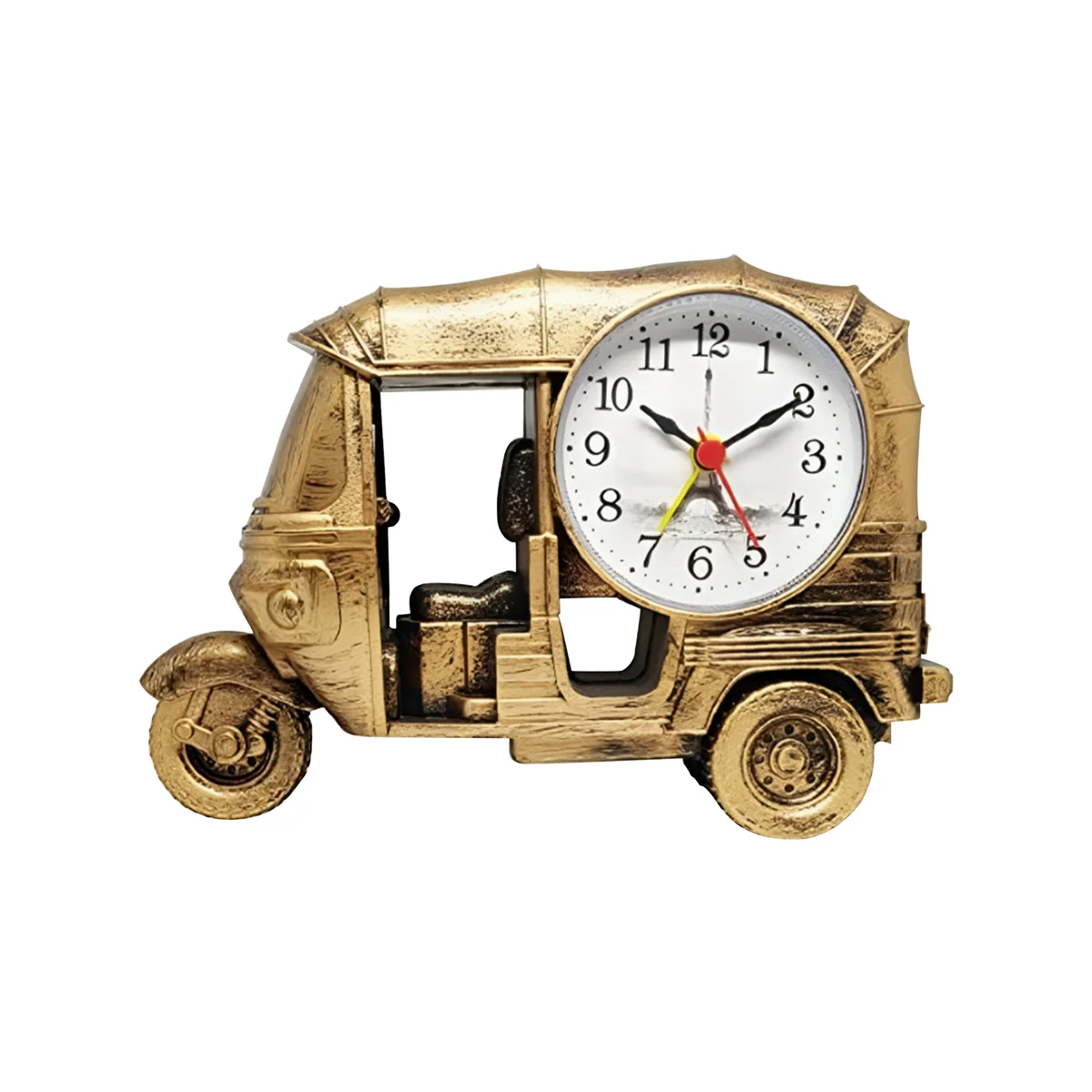 Modern three wheeler clock in plastic with analogue display, shown on a wooden desk in a bright room setting