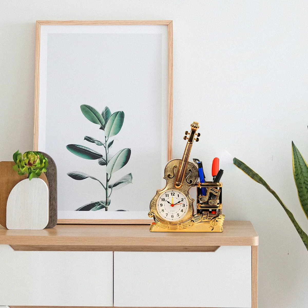 Vintage style desk clock shaped like a violin with an analog alarm and built-in pen holder in French gold finish