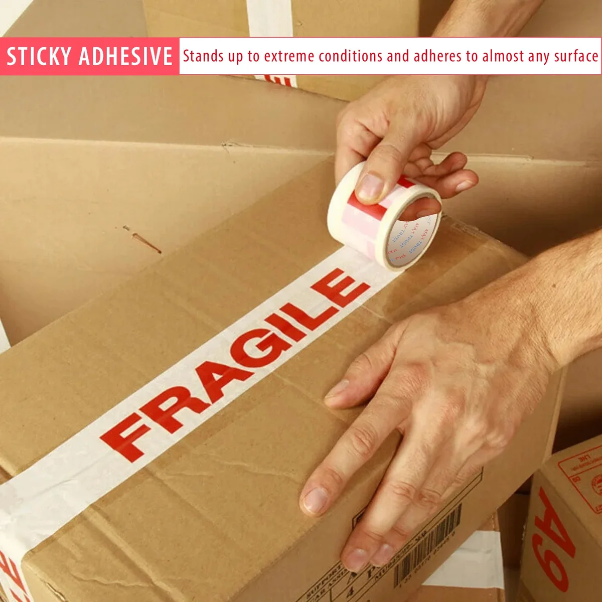 Roll of white and red fragile printed tape with self-adhesive, designed for sealing cartons and packaging boxes securely