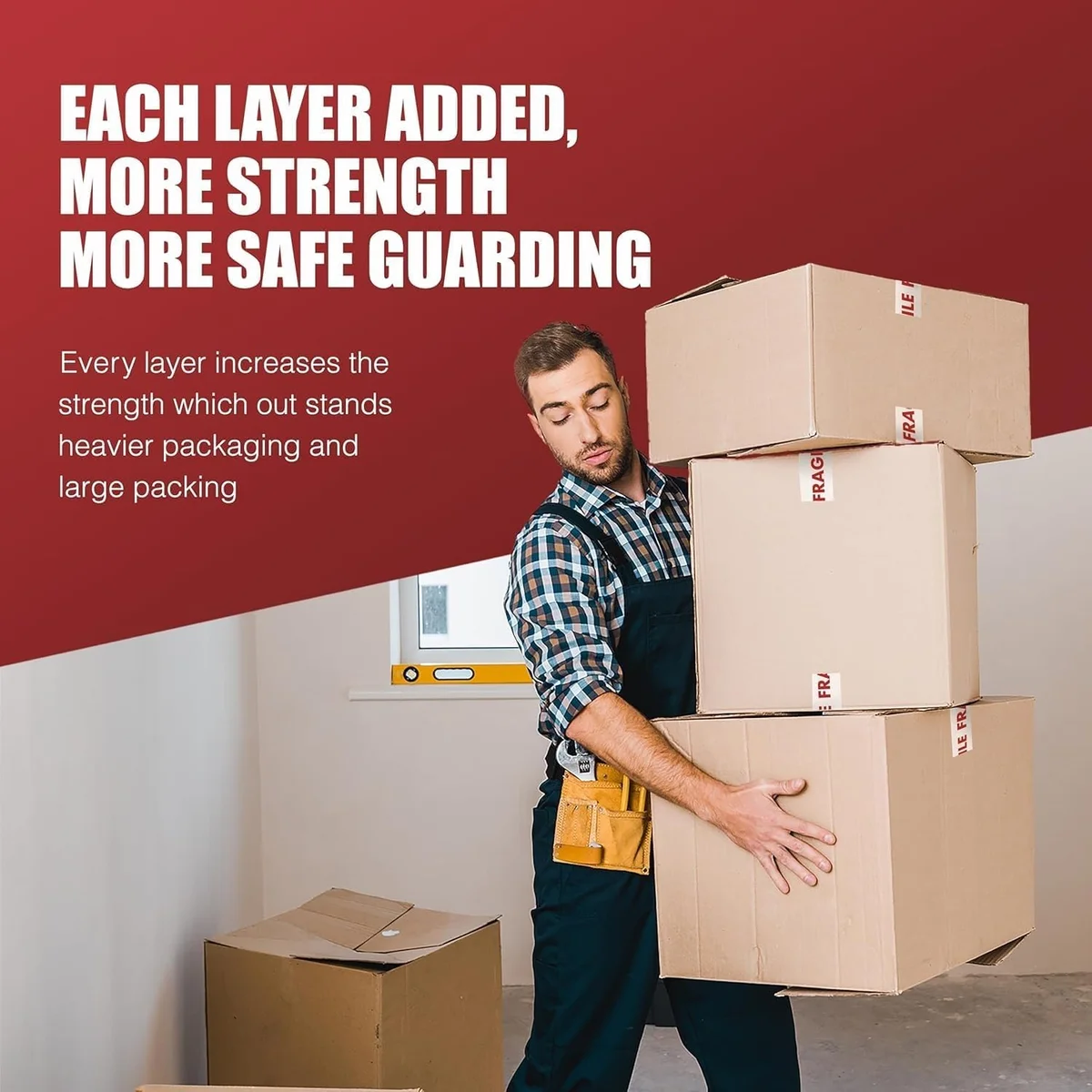 Roll of white and red fragile packaging tape with self-adhesive, heavy-duty print for sealing cartons and boxes