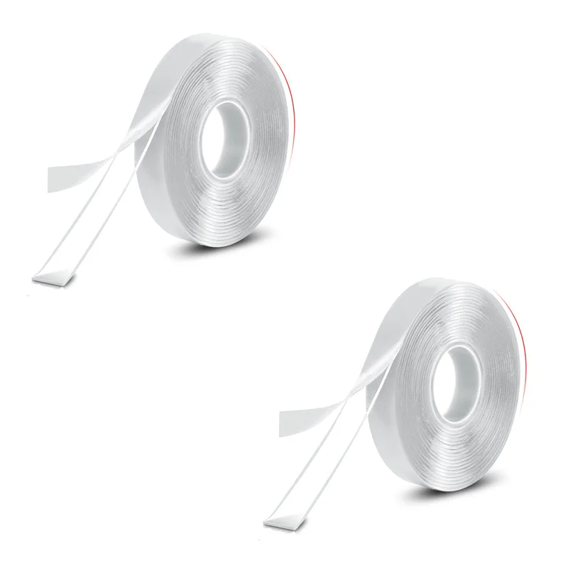 Two rolls of heavy duty mounting tape with transparent acrylic foam core on white background