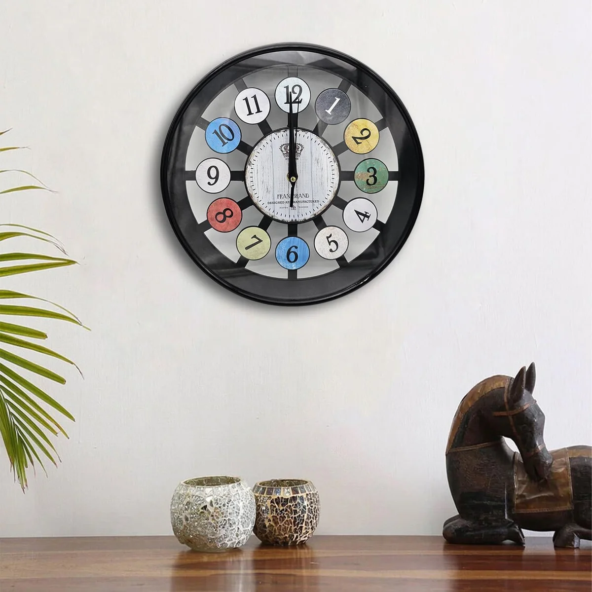 Retro glass wall clock with colourful numbers on a 30cm tempered glass face and slim round frame on white background