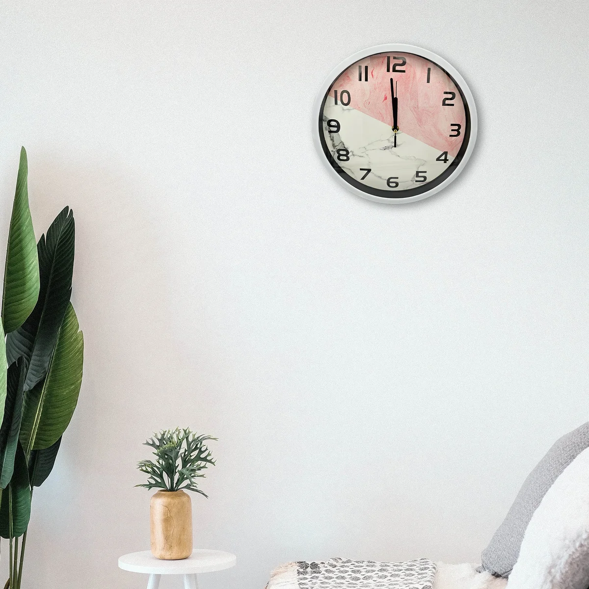 Round vintage-style quartz wall clock with black metal frame and easy-to-read analog numbers on white face