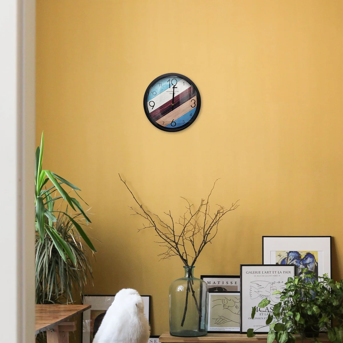Round modern quartz wall clock with colorful numbers and hands, metal frame, and tempered glass face, 30 cm diameter