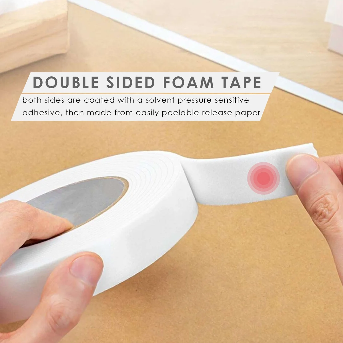 Six rolls of white foam mounting tape stacked, showing double-sided adhesive surface and foam thickness.