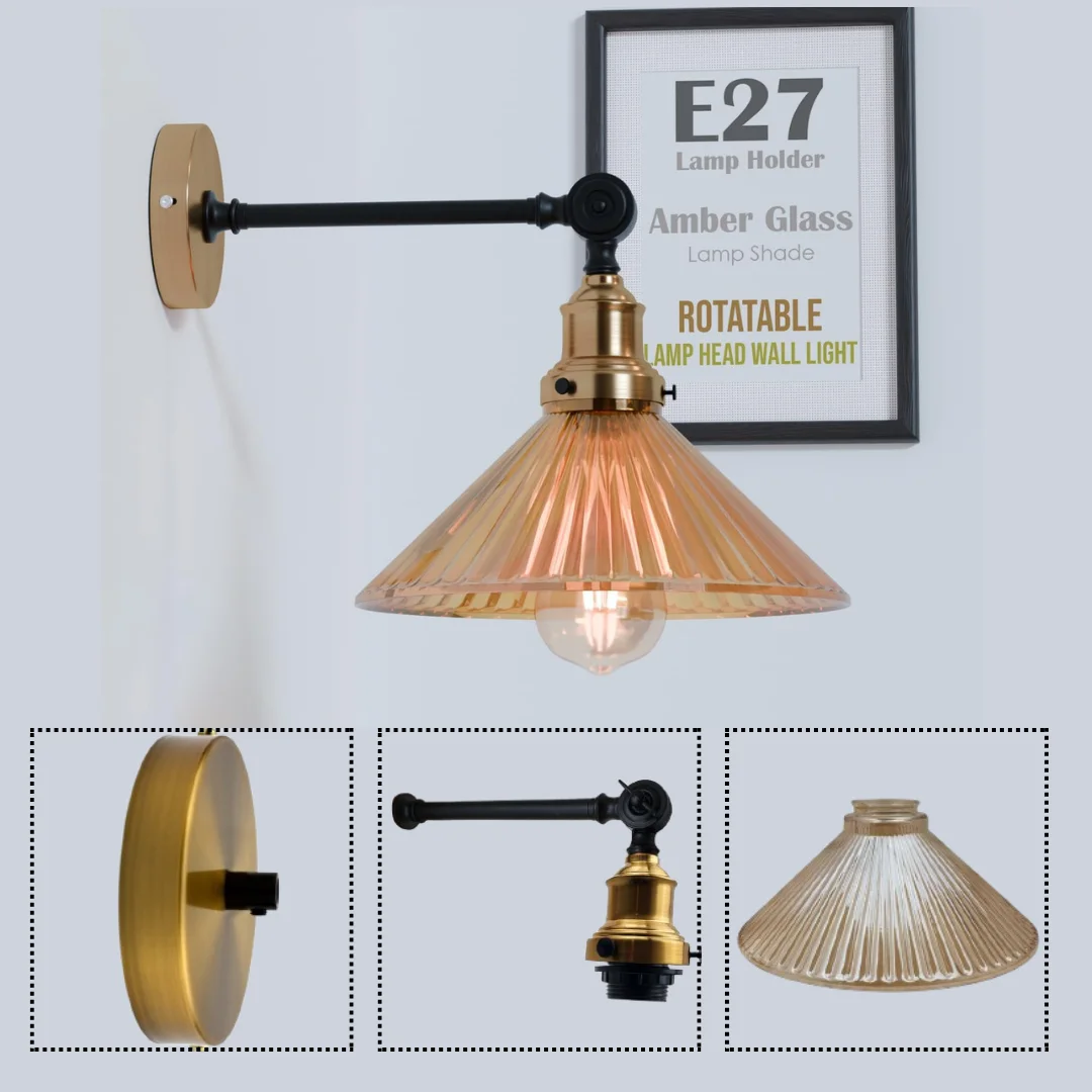 Adjustable brass and black arm ribbed glass wall lamp with amber fluted shade mounted on white wall