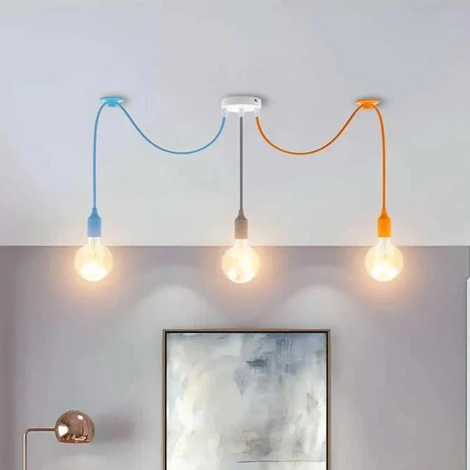 3-head colourful pendant light with orange, blue, and grey fabric cables hanging from a metal ceiling rose
