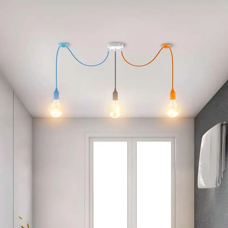 3-head colourful spider pendant light with orange, blue, grey fabric cables and E27 bulb pendant holders hanging from ceiling rose