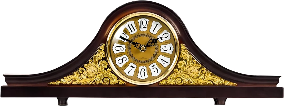 Vintage mantel clock with leather accents, large black numerals on white face, round retro design on wooden shelf