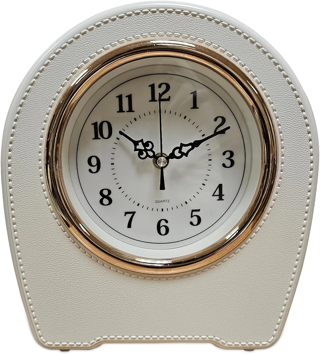 Small mantel clock with vintage leather finish in black, showing clear clock face on a wooden desktop table