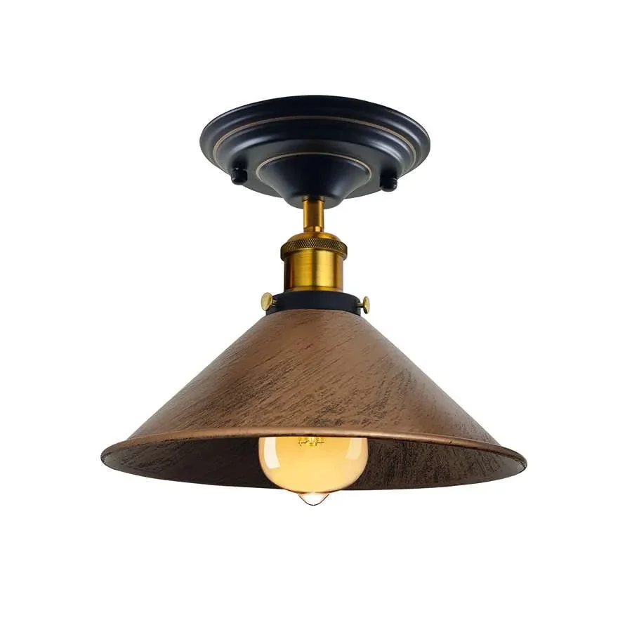 Vintage industrial pendant light with metal cone shade in yellow brass finish