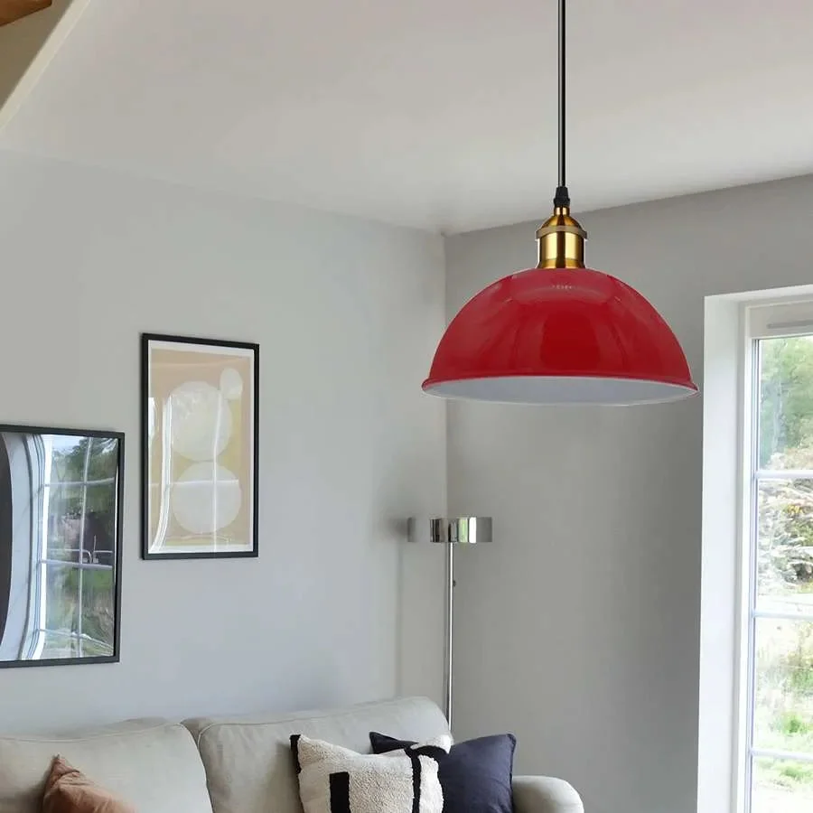 Single vintage metal pendant light with adjustable cable, showcasing industrial style lighting in a minimalist design
