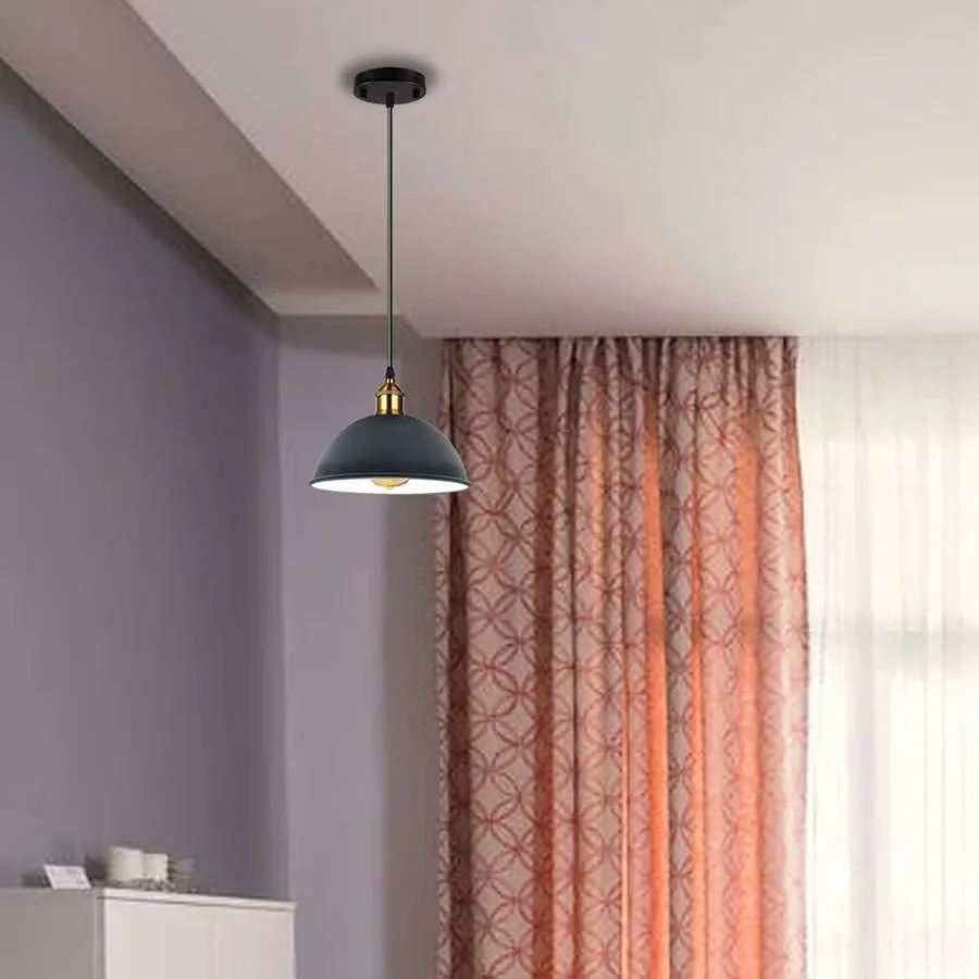 Vintage pendant light with metal shade hanging from ceiling, adjustable cable, ideal for indoor spaces like kitchens and cafes