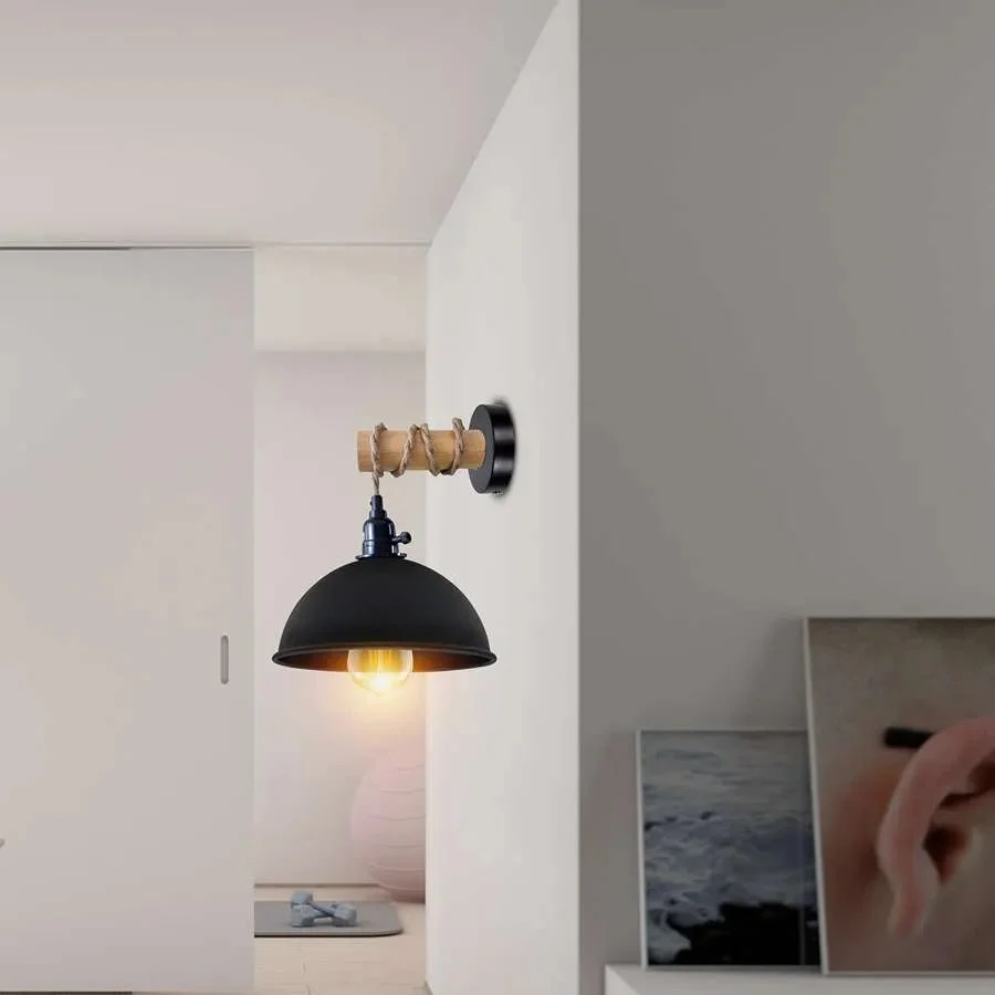 Vintage wood arm wall light with metal dome shade hanging from ceiling by a 2-meter cable in a rustic interior setting