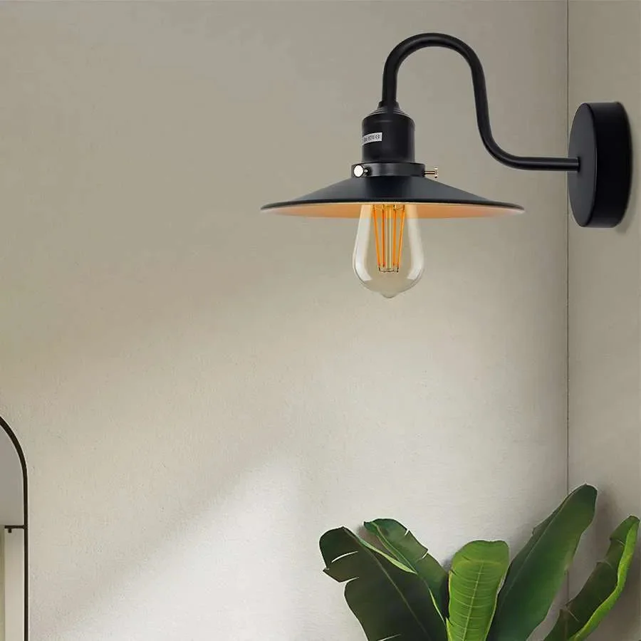 Industrial vintage sconce with curved swan neck arm and metal finish, wall-mounted with E27 bulb socket visible