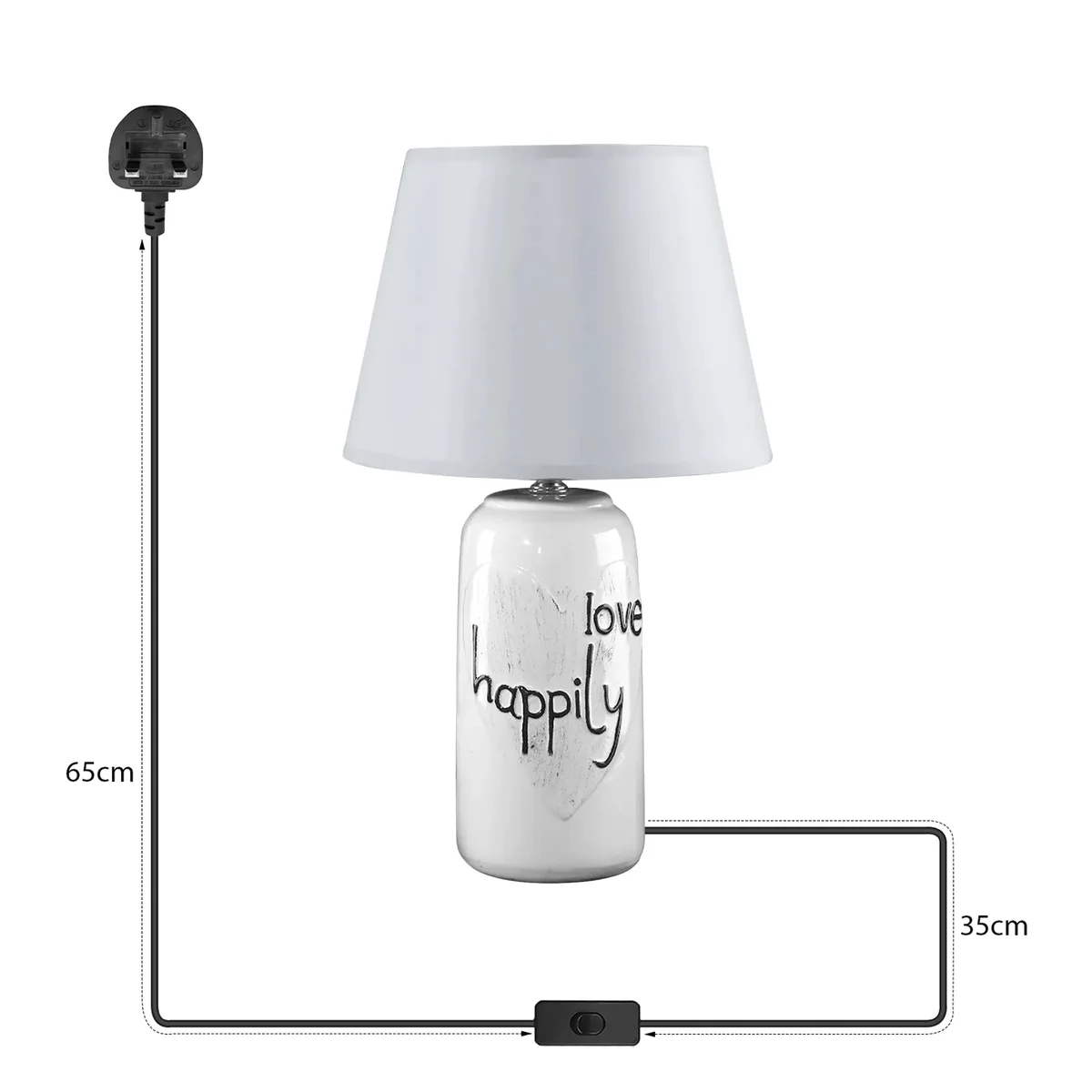 Ceramic base fabric shade lamp with coolie-shaped shade on bedside table emitting soft warm light