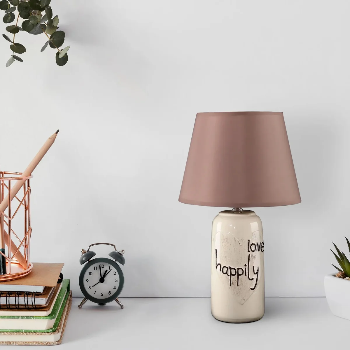 Elegant bedside table lamp with ceramic base and fabric shade, ideal for bedroom or living room lighting