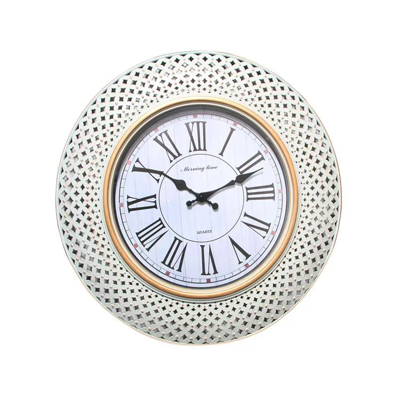 Retro round wall clock with black Roman numeral clock face and black hands on white background, battery powered