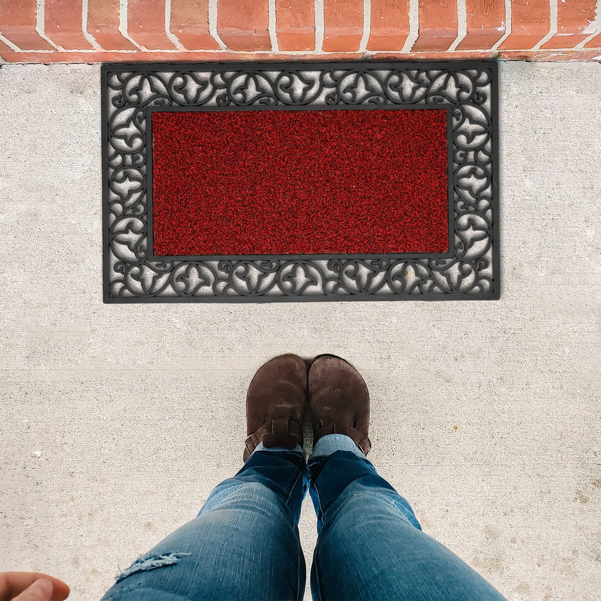 Heavy duty door mat made of thick black rubber with textured surface and non-slip backing, rectangular 75x45 cm tray style