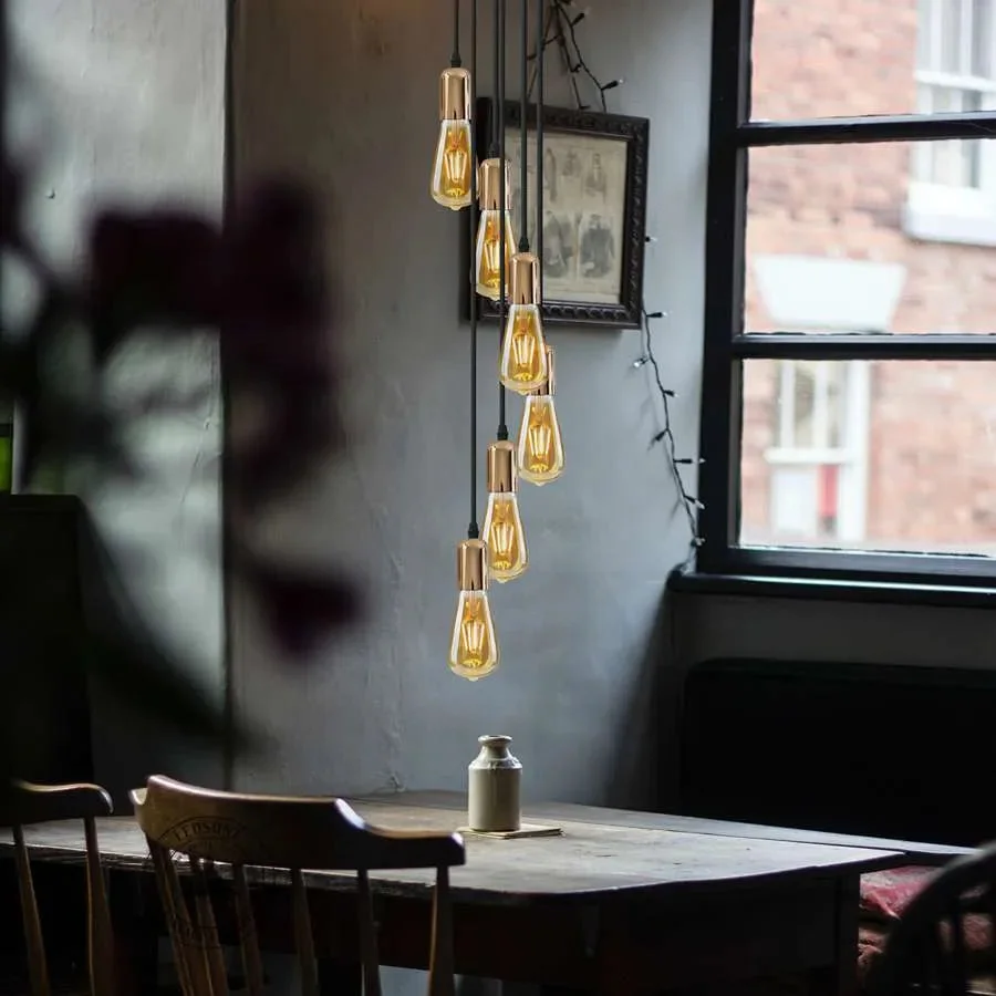 Adjustable height vintage metal cluster lighting with six E27 bulb pendant fittings and round ceiling rose in dining room setting