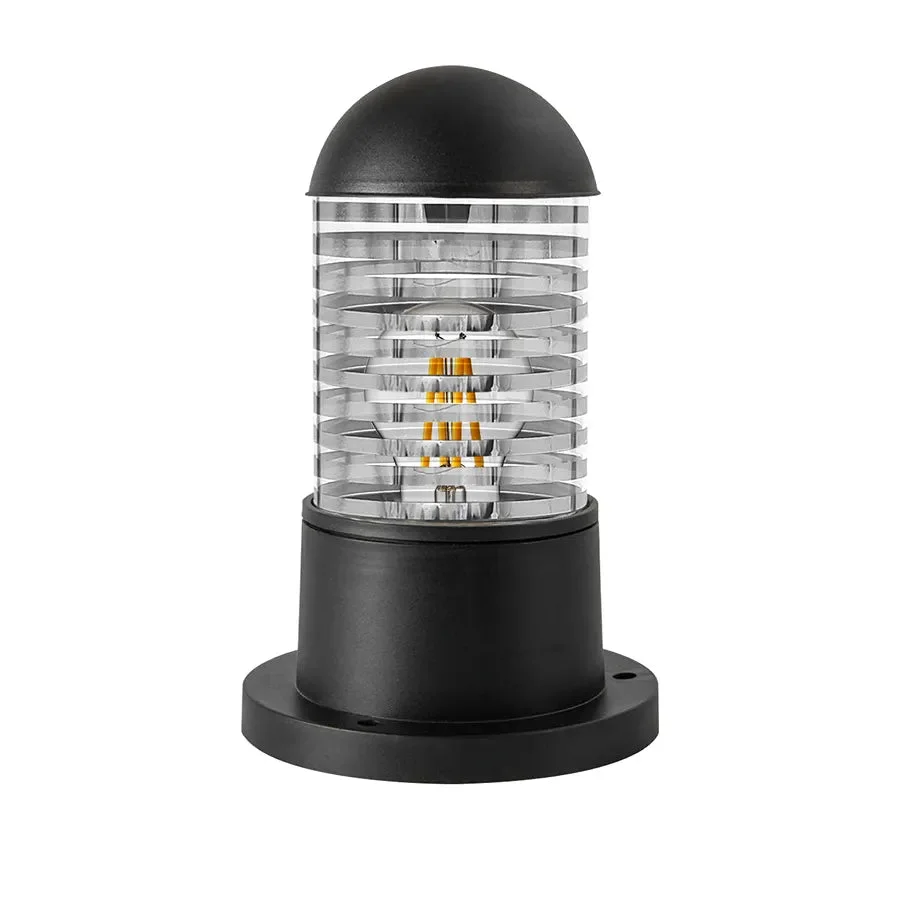 Black cylindrical outdoor bollard light with rippled glass shade, mounted on a garden post for exterior lighting