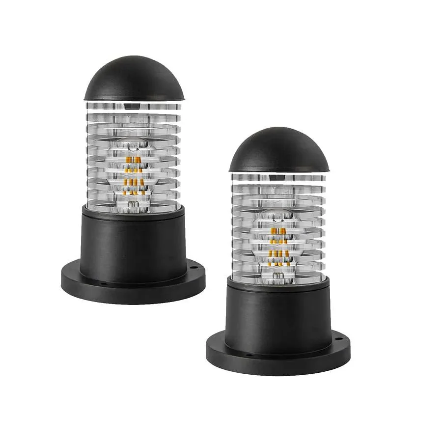 Black cylindrical outdoor bollard light with rippled glass shade mounted on a garden post, modern design, weatherproof