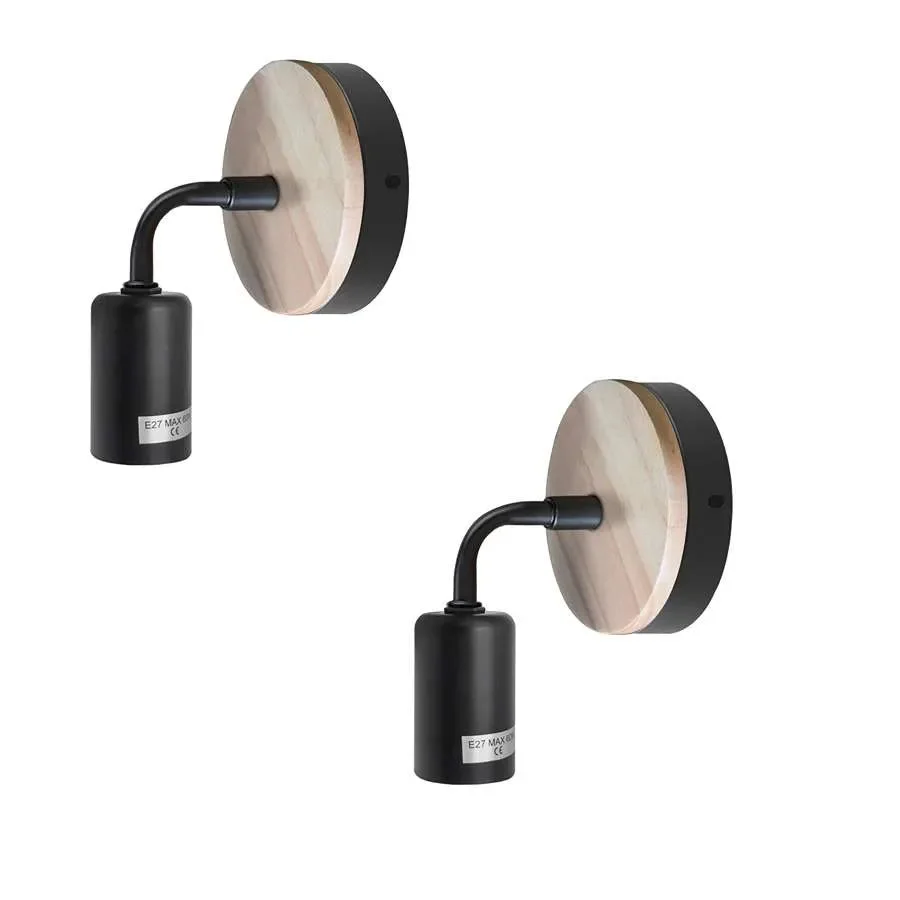 Wood bedside wall lamp with metal and wood design, industrial vintage style, mounted on a white wall next to a bed