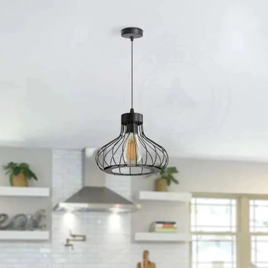 Black metal pendant light with single bulb inside wire cage shade hanging from ceiling with adjustable cable