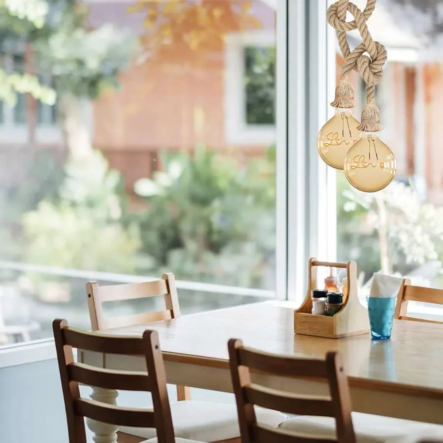 Modern hemp rope light hanging from ceiling, showing adjustable knots and dimmable rope light design in rustic style