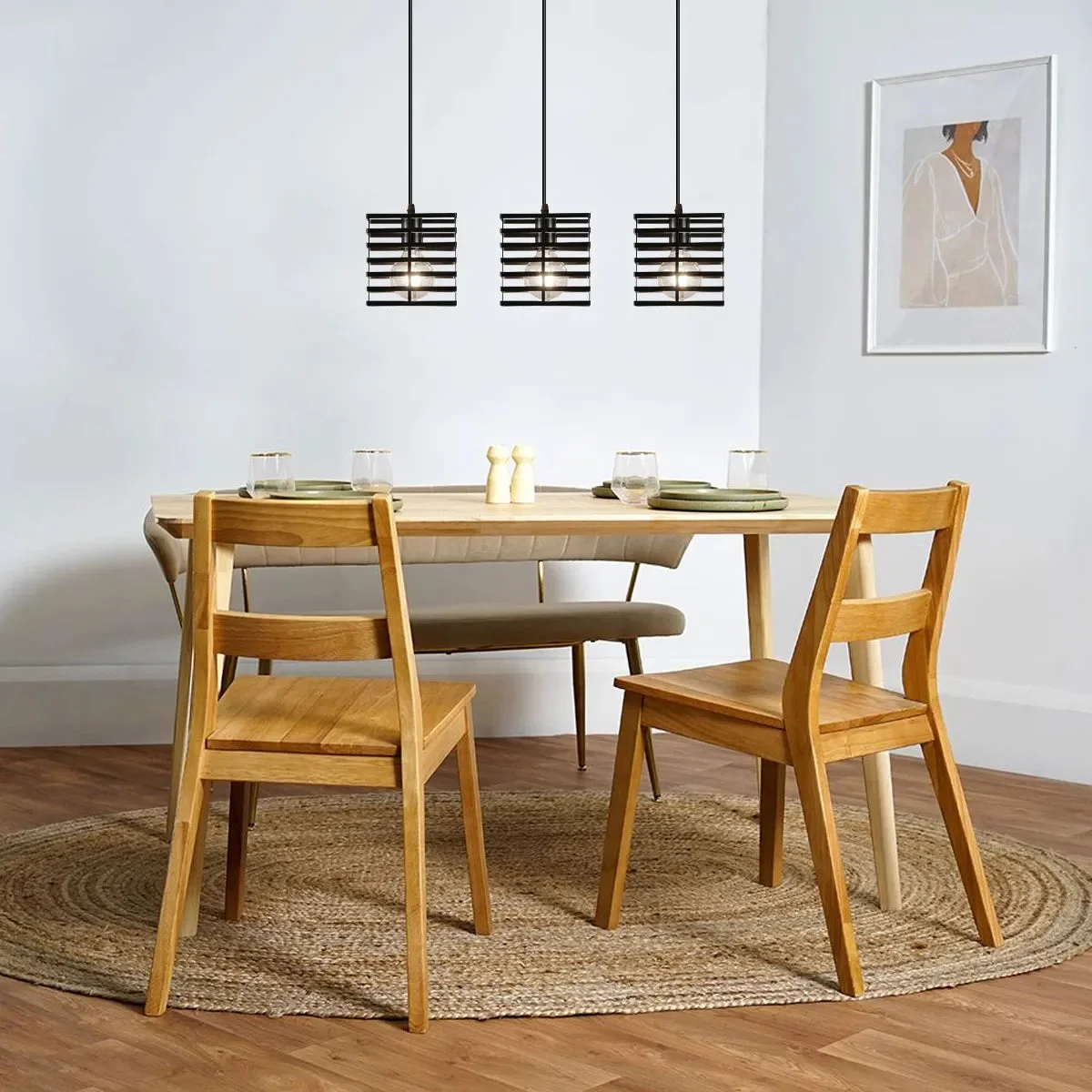Black metal 3-light industrial pendant light with square wire cages and adjustable hanging cords.