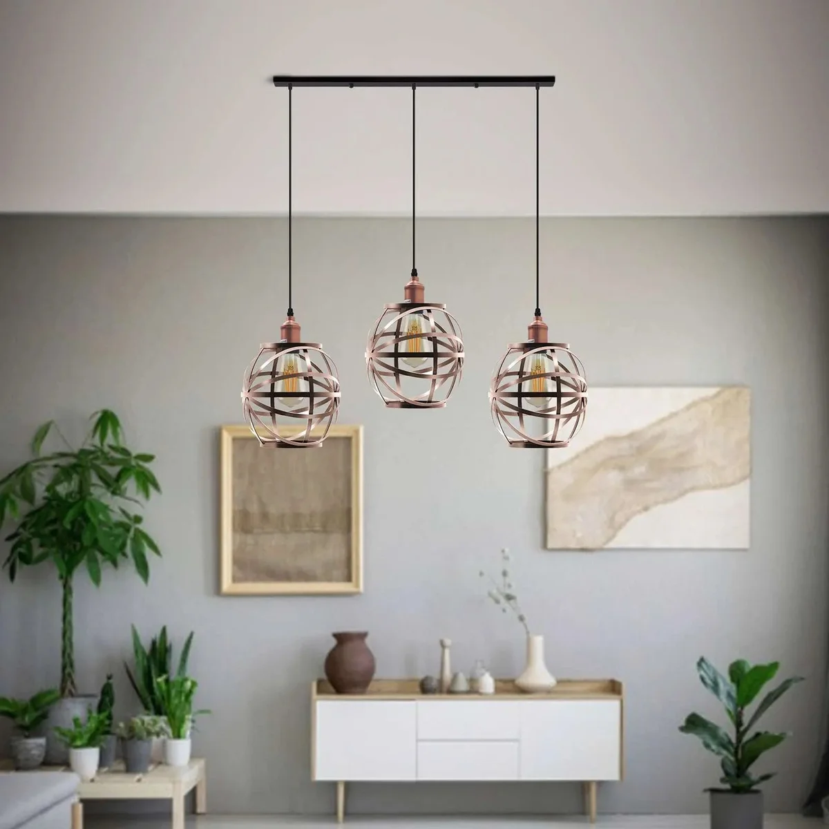 3 head pendant light with three black wire cage shades hanging from a metal ceiling rose, industrial style design