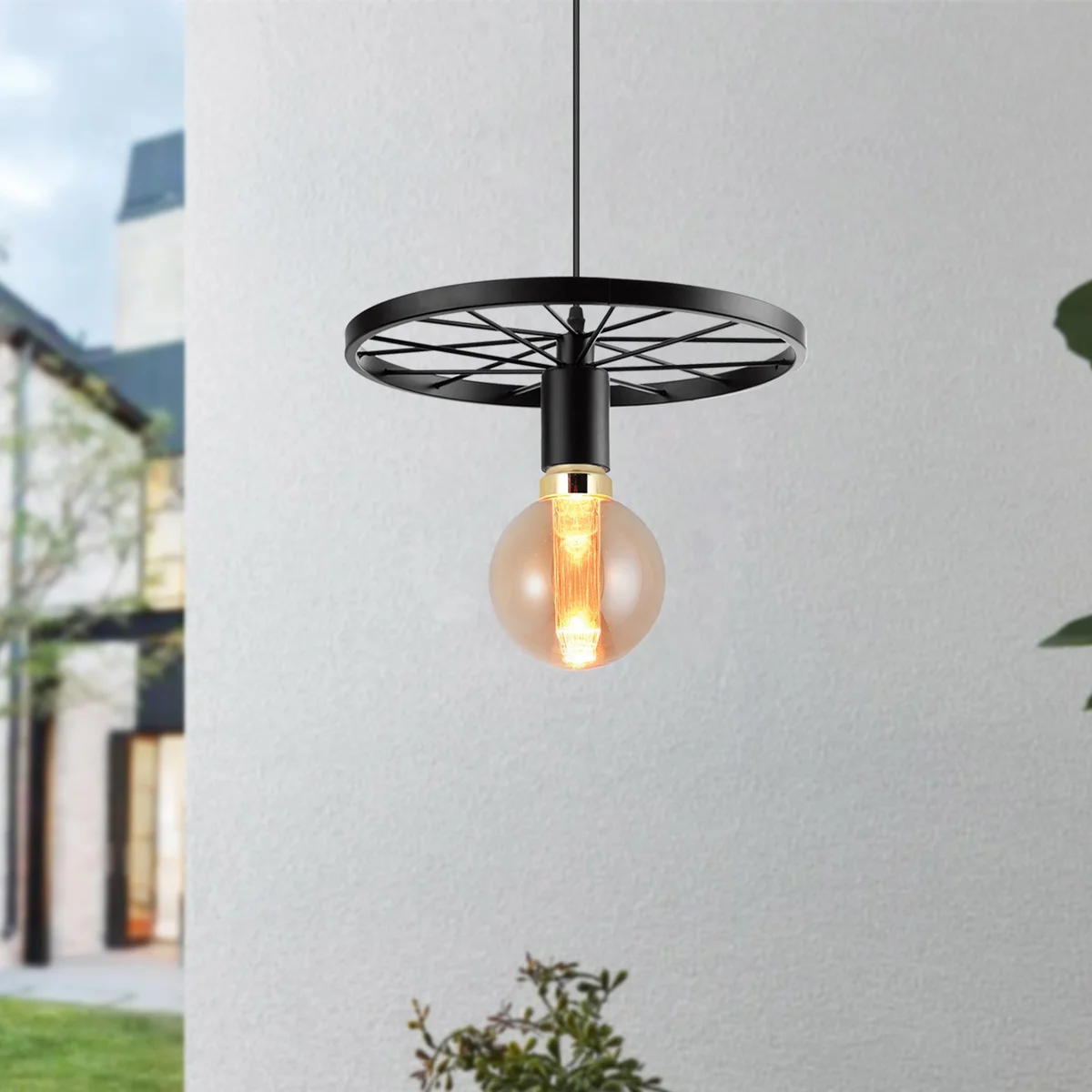 Vintage industrial metal wheel pendant with exposed bulbs, a retro ceiling light for loft or café interiors