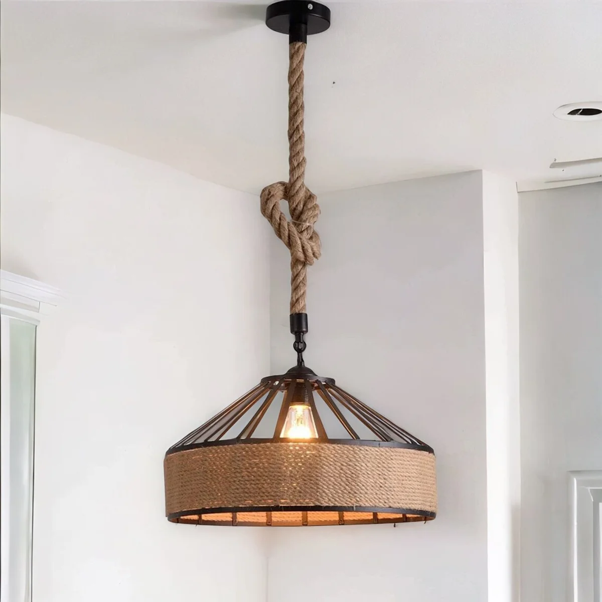Rustic hemp rope pendant light with black metal cage and free bulb, perfect for industrial and retro home decor