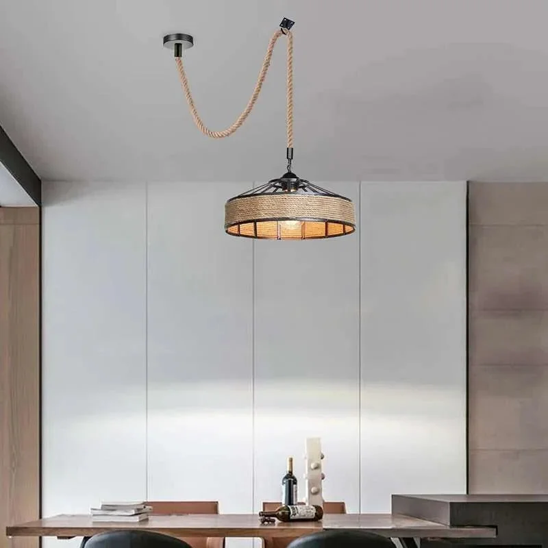 Modern pendant ceiling light with black metal shade and hemp rope cord, suitable for various room decors.